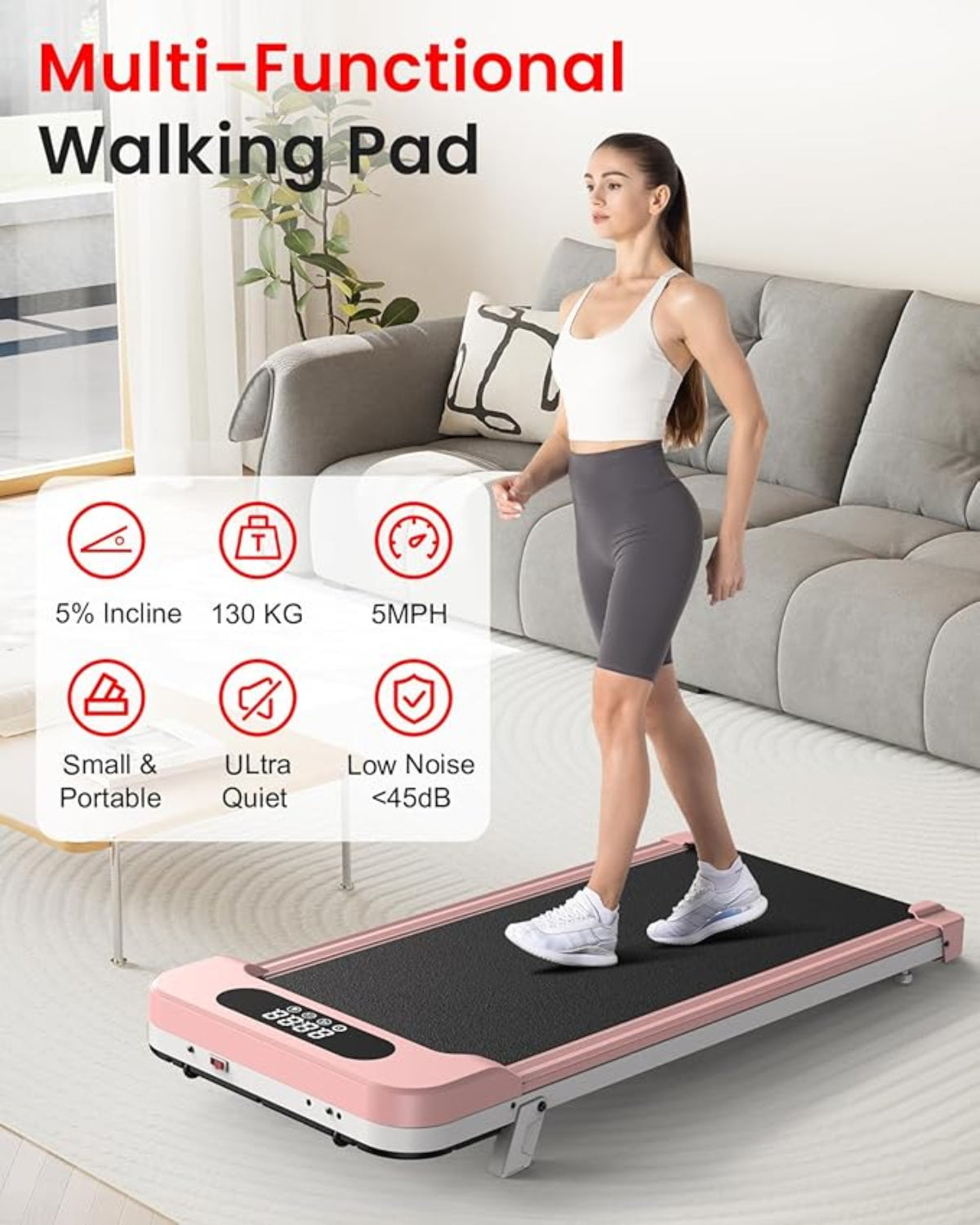 Nainen käyttää vaaleanpunaista monitoimista kävelyalustaa olohuoneessa.